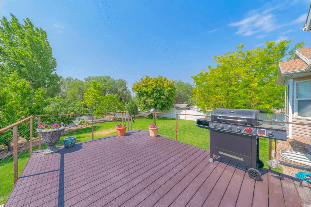 Durable Vinyl Planks in Backyard of Farmhouse