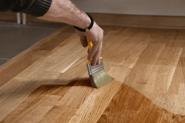Floor refinishing with brush