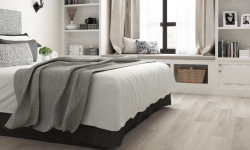 White oak LVP flooring on bedroom